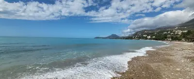 a view of the beach on a cloudy day at UGS Apartment in Sutomore
