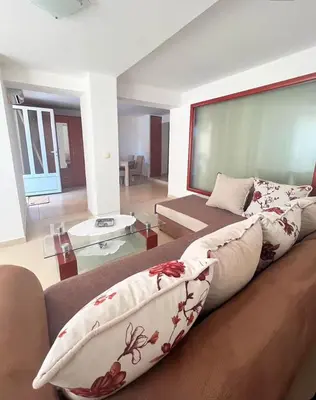 a large living room with a couch and a living room at Villa INA in Kaluđerac