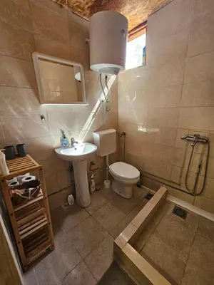 a bathroom with a toilet and a sink at Sunrise in Ulcinj