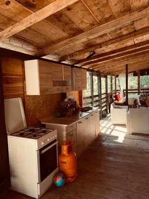 a kitchen with a stove top oven in a room at Sunrise in Ulcinj