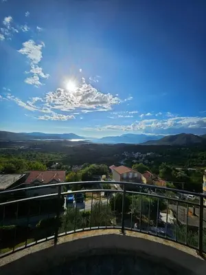 a view of the valley from the balcony of a house at Sunset Vista Kotor in Kotor