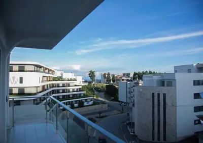 a view of a city from the balcony of a building at Apartment Nimes in Ulcinj