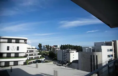 a view of a city from the balcony of a building at Apartment Nimes in Ulcinj