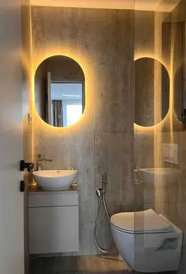 a bathroom with a sink and a toilet and a mirror at Apartmani Vanity Budva in Budva