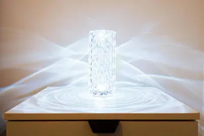 a clear glass vase sitting on top of a table at Brazos Apartment in Kotor