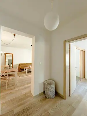 a living room with a door leading to a dining room at Adriatic Escape -Modern Sea View Apartment,Special Summer Deal in Pržno
