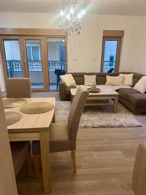 a living room with a couch and a table at The Coastal Charm in Pržno