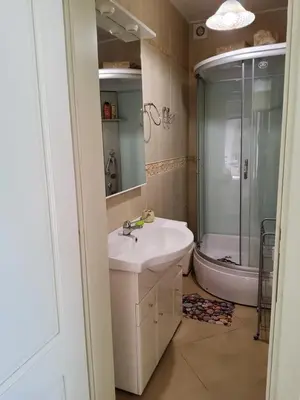 a bathroom with a sink and a shower at Glorious in Kotor
