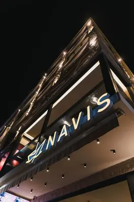 a sign on top of a gymnasium at Hotel Navis in Ulcinj