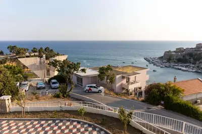 a view of the ocean from a house at Dea Apartments in Ulcinj