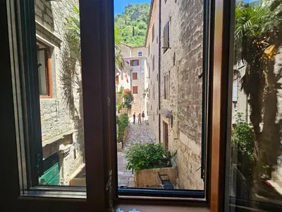 a view of an alley from a window at Patrik Patrik in Kotor