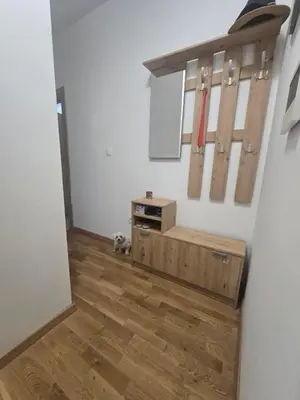 a room with baseball bats hanging on the wall at Apartman 44 Bečići in Becici