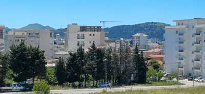 a view of a city with buildings and trees at KalamperovicApartmani in Bar