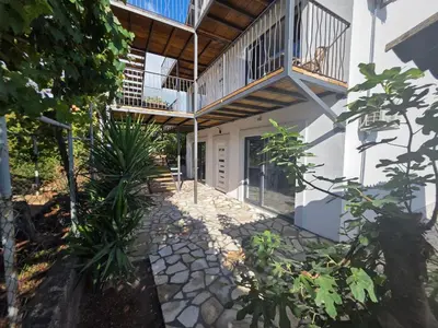 an external view of a house with a balcony at Villa Luca in Krimovice