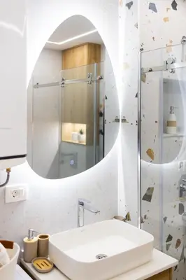 a bathroom with a sink and a mirror at Fox apartman in Cetinje