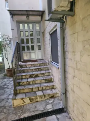 a set of stairs leading up to a door at Sun & Sea Terrace Apartment in Becici