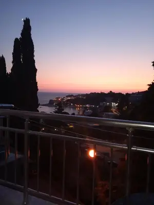 a sunset from the balcony of our apartment at Wonderful Seaview Apartment in Ulcinj