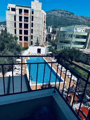 a view of a swimming pool from a balcony at Apartment Comfort A15 in Bar
