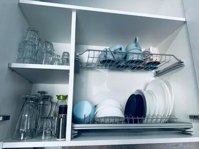 a white refrigerator filled with dishes and other items at Apartment Comfort A15 in Bar
