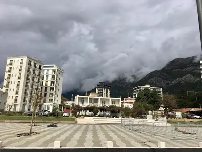 a view of a city with buildings and a mountain at Wonder home in Sutomore
