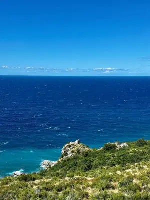 a view of the ocean from the top of a hill at Seaview Retreat Reževići in Reževići