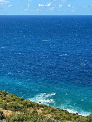 a view of the ocean from the top of a hill at Seaview Retreat Reževići in Reževići