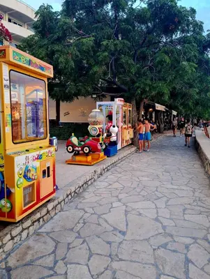 a group of toy trains on a street at HELEN LUX Apartments in Dobra Voda