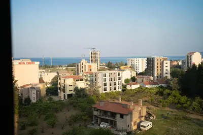 a view of a city with tall buildings at FAVEHOME Apartment Sea View Pool Parking 2 Bedrooms Near Beach in Bar