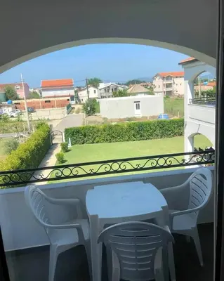 a view from a balcony with a table and chairs at Konak in Donji Štoj