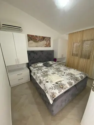 a bedroom with a bed in a room at Nana Dea 2 in Utjeha