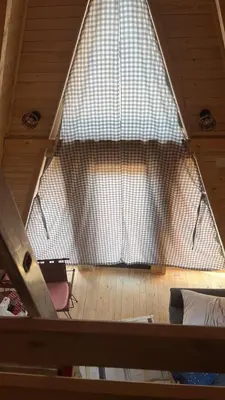 a view of a large window in a room at Podgoricka Koliba