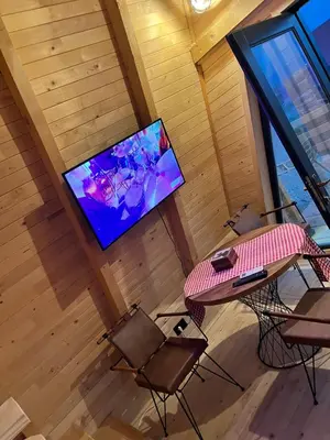 an overhead view of a room with a table and a tv at Podgoricka Koliba