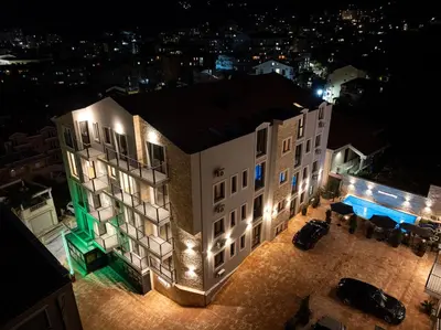 an aerial view of a building at night at Cozy Studio 11 Budvablue with Pool - Parking in Budva