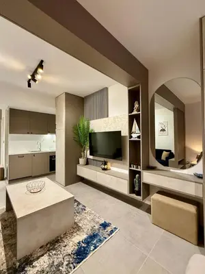 a large living room with a television and a couch at Luxury Studio No3 with Pool and free Parking Budvablue in Budva