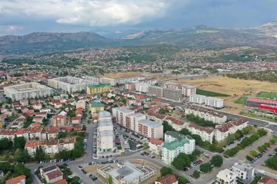 an aerial view of a city with buildings at Floret Suite in Podgorica