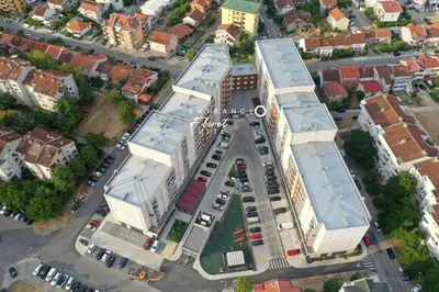 an aerial view of a city with buildings at Floret Suite in Podgorica