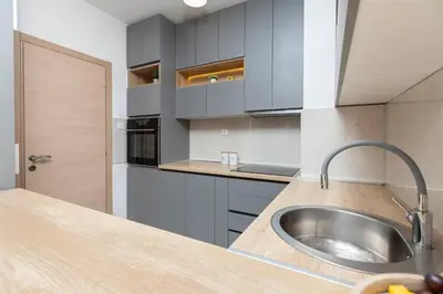 a kitchen with a sink and a counter top at Princess Milena Apartments - Apartment Milena in Becici