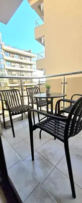 a group of benches sitting on a balcony at Apartment Nemanja by Princess Milena in Becici