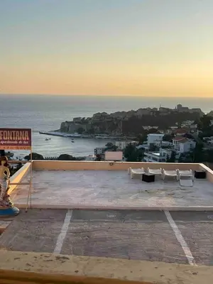 a view of the ocean from the roof of a building at Fontana Apartments 1A in Ulcinj