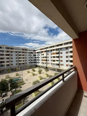 an apartment balcony with a view of a parking lot at Top Apartments Vuković in Podgorica