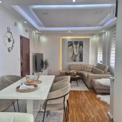 a living room with a couch and a table at Apartment Suka in Ulcinj