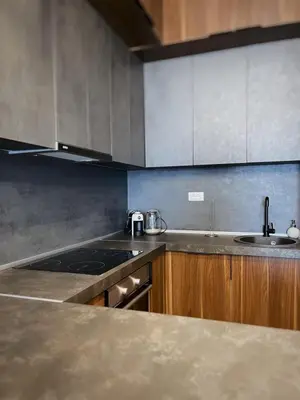 a kitchen with a sink and a counter top at Apartman Bulevar in Ulcinj