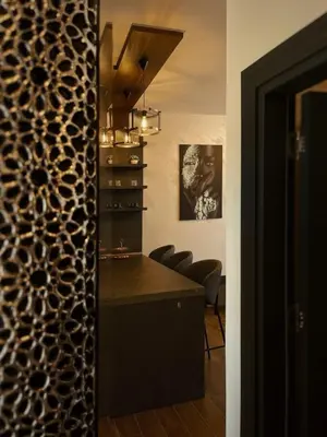 a kitchen with a table and chairs in a room at Apartman Bulevar in Ulcinj