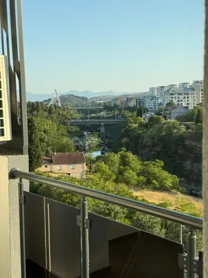 a balcony with a view of a city at Diamond H in Podgorica