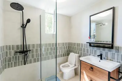 a bathroom with a toilet and a sink at Pelican Bay House - Skadar Lake in Krnjice