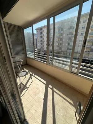 a balcony with a view of a building at Stex Elite City Kvart in Podgorica