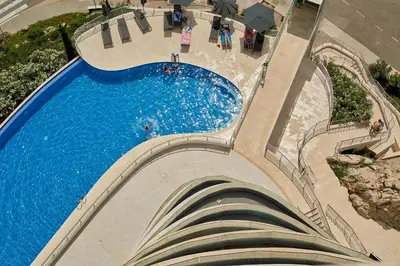 an overhead view of a swimming pool at a resort at Skyline resort CG in Budva