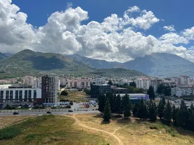 a view of a city with mountains in the background at Luxury Apartment SOHO CITY in Bar