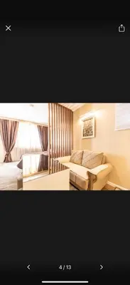 a room with a bed and a couch in a room at Little star in Ulcinj