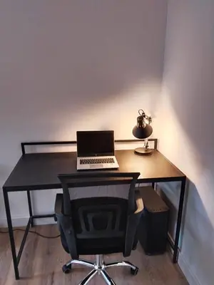 a desk with a laptop computer on top of it at Little Heaven Escape in Budva
